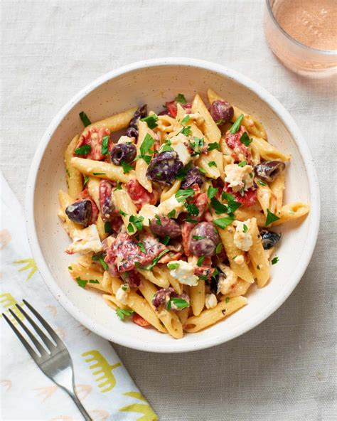 pasta-with-hummus-olives-feta-kitchn-kitchn image