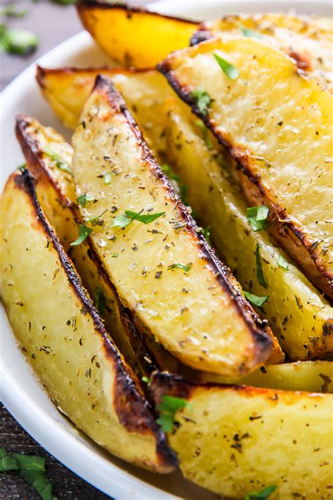 extra-crispy-baked-garlic-herb-potato-wedges image