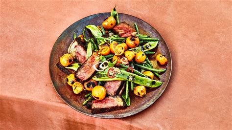 grilled-strip-steak-with-blistered-tomatoes-recipe-bon image