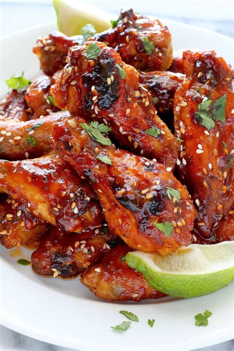 sweet-and-spicy-sriracha-baked-chicken-wings-baker image