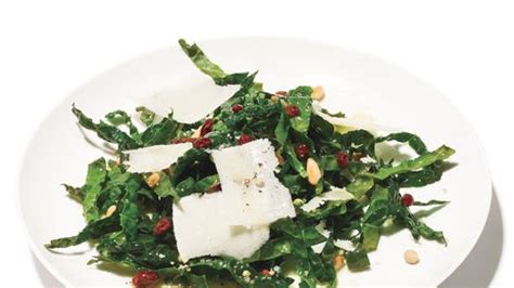 kale-salad-with-pine-nuts-currants-and-parmesan image