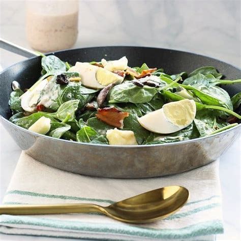 warm-and-loaded-spinach-salad-craving-something image