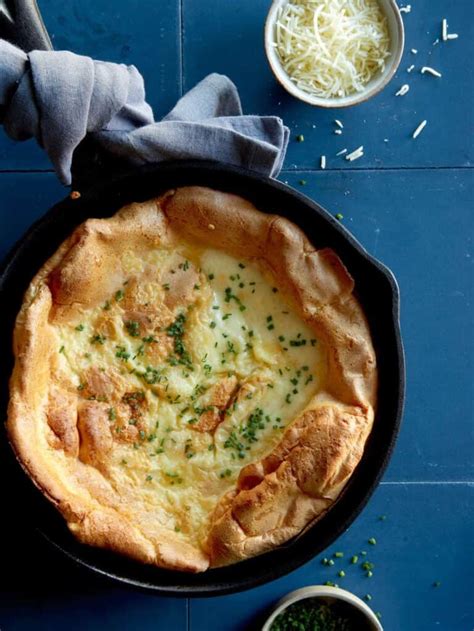 herb-and-cheese-dutch-baby-spoon-fork-bacon image