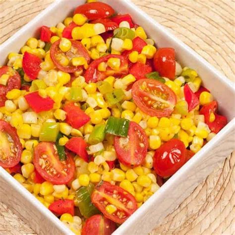 sauteed-sweet-corn-with-tomatoes-and-tarragon image