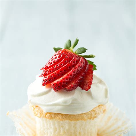 angel-food-cupcakes-with-coconut-frosting image