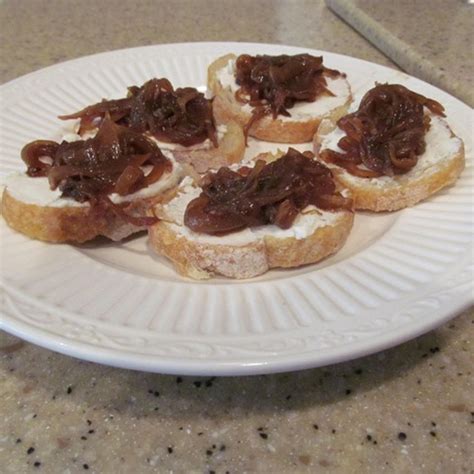 goat-ricotta-crostini-with-spicy-onion-garlic-jam image