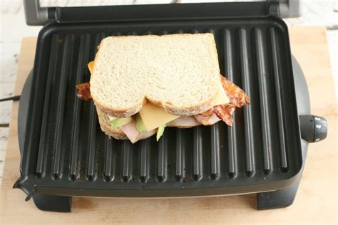 turkey-bacon-avocado-panini-a-farmgirls-kitchen image