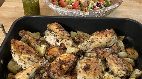 roast-chicken-recipe-with-garlic-and-herbs-from-rachael image