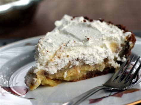 lemon-cream-pie-with-pecan-gingersnap-crust image