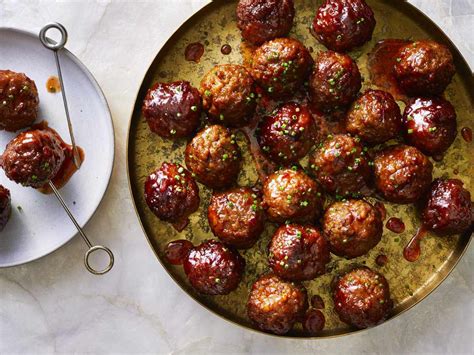 slow-cooker-grape-jelly-meatballs-recipe-southern-living image