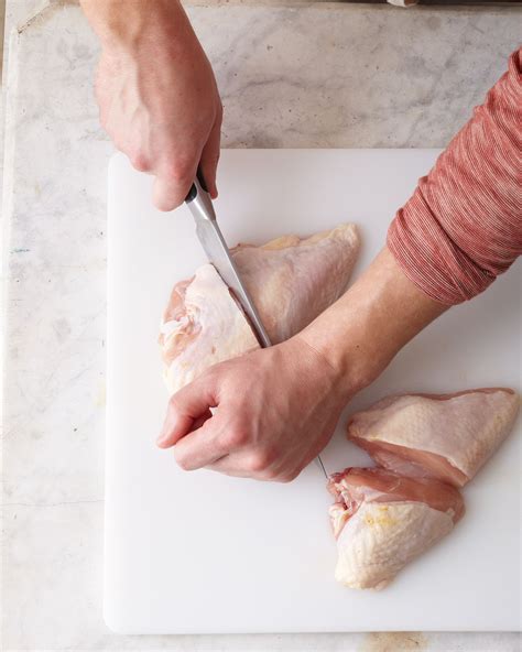 step-by-step-instructions-for-cutting-up-a-whole-chicken image
