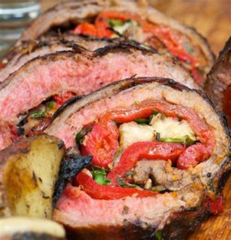 grilled-italian-stuffed-flank-steak-recipe-flavorite image