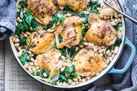 chicken-thighs-with-white-beans-and-wilted-greens image