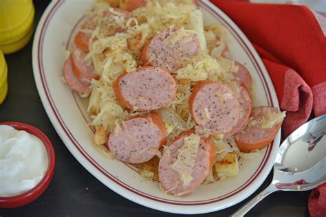 slow-cooker-sauerkraut-and-sausage-savory-experiments image