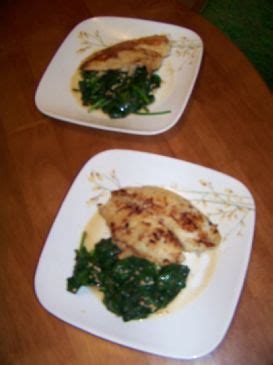 tilapia-over-spinach-with-a-garlic-wine-butter-sauce image