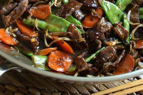 beef-stir-fry-with-snow-peas-and-mushrooms-the-daring image
