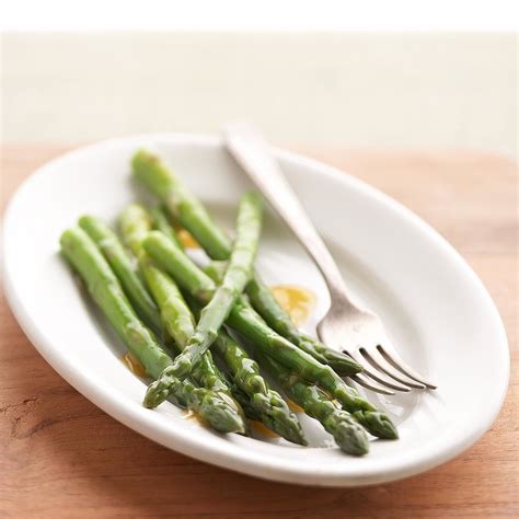 asparagus-with-warm-vinaigrette-recipe-eatingwell image