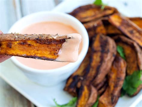 zesty-roasted-sweet-potato-wedges-with-spicy-yogurt image