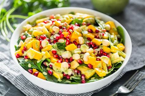 tropical-spinach-salad-with-creamy-coconut-lime image