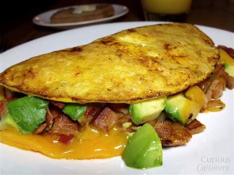 turkey-bacon-avocado-turkey-club-omelette image