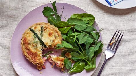 wild-salmon-and-asparagus-quiches-recipe-bbc-food image