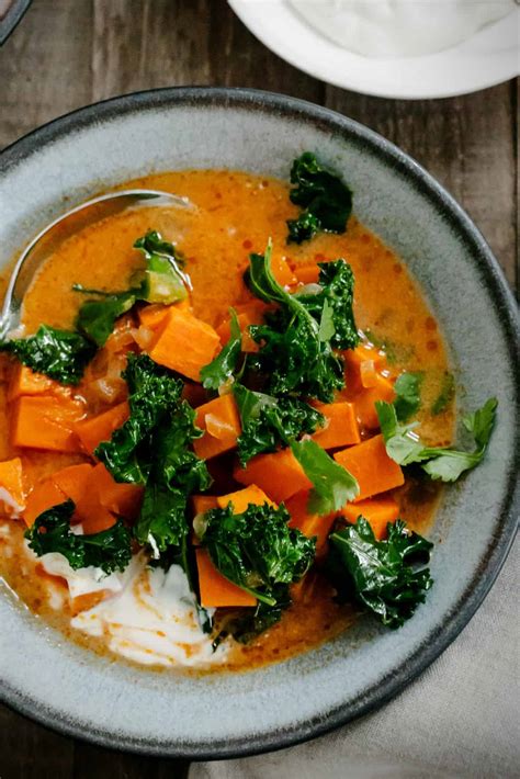 sweet-potato-and-kale-coconut-curry-soup-kitchen image
