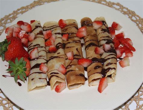 eggless-nutella-crepes-with-strawberries image