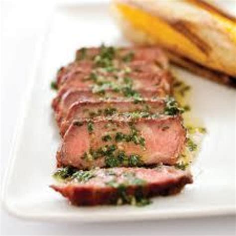 charcoal-grilled-argentine-steaks-with-chimichurri image