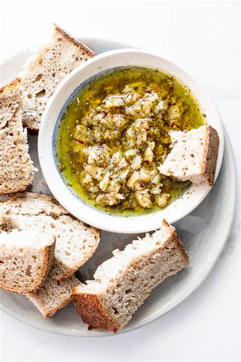 roasted-garlic-olive-oil-bread-dip-simply-delicious image