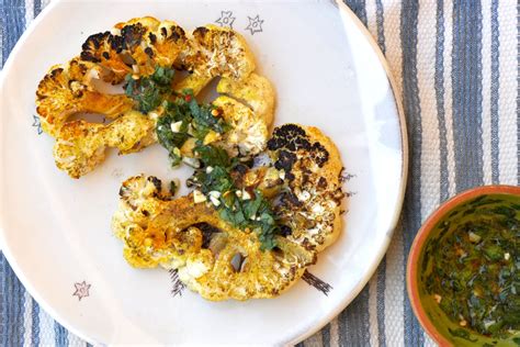 grilled-cauliflower-steaks-with-fresh-herb-sauce image