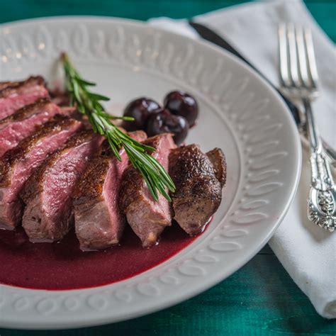 pan-seared-duck-breast-with-cherry-port-wine-reduction image
