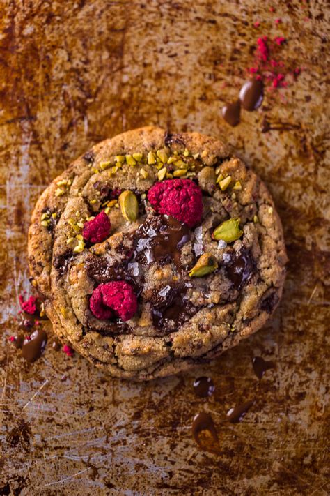 raspberry-pistachio-chocolate-chunk-cookies-baker image
