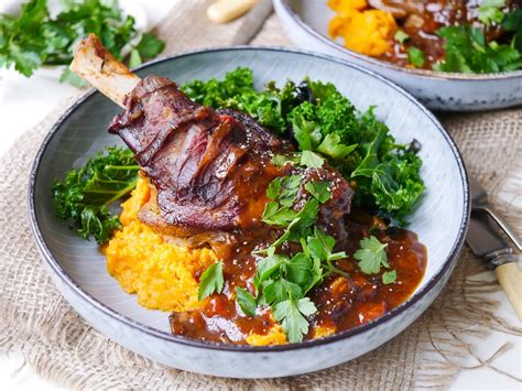 thyme-and-balsamic-slow-cooker-lamb-shanks-nourish image