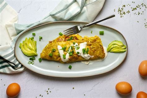 crab-omelette-with-garlic-yogurt-sauce-champagne image