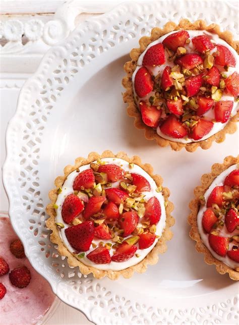 strawberry-and-pistachio-tarts-recipe-delicious image
