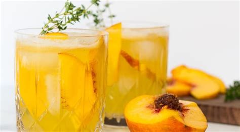 peach-gin-fizz-cocktail-recipe-valet image