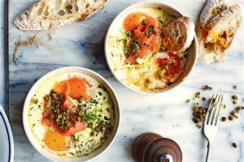 french-baked-eggs-with-smoked-salmon-tarragon-cream image