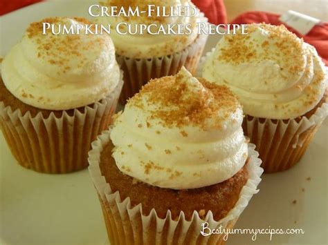 cream-filled-pumpkin-cupcakes-recipe-all-food image