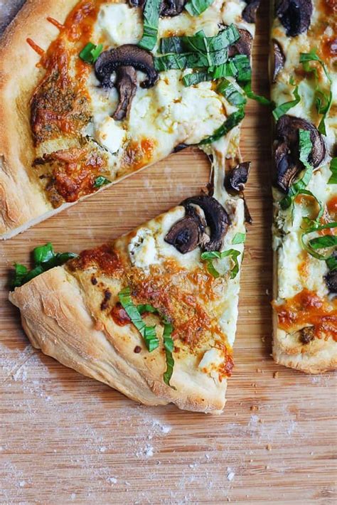 homemade-pesto-pizza-with-mushrooms-and-goat-cheese image