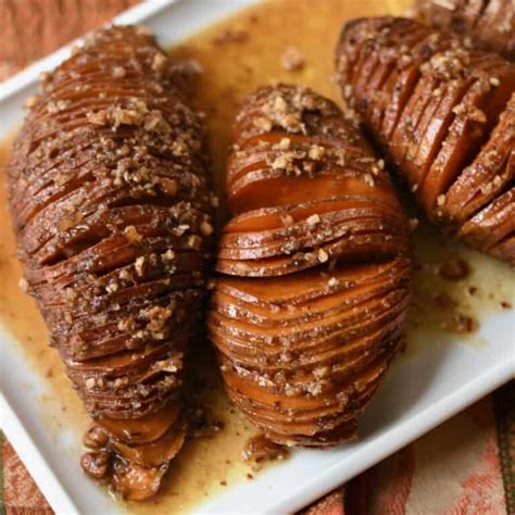 hasselback-sweet-potatoes-maple-syrup-and-pecans image