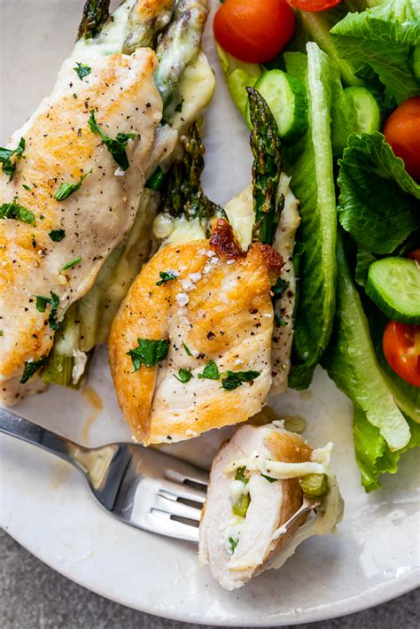 cheesy-asparagus-stuffed-chicken image