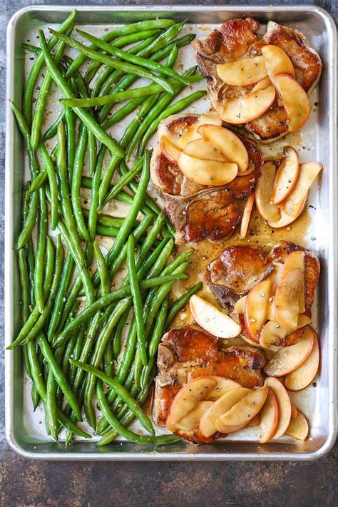 baked-apple-pork-chops-and-green-beans-damn-delicious image