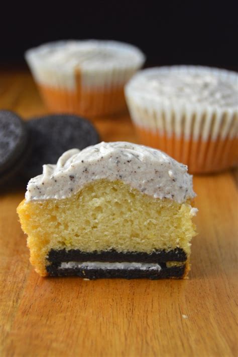 oreo-surprise-cupcakes-with-cookies-and-cream-frosting image