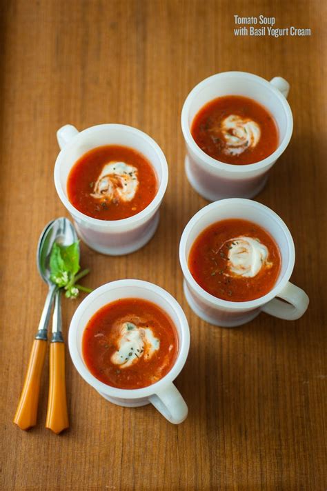 tomato-soup-with-basil-yogurt-cream-the-splendid-table image
