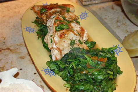 sauteed-chicken-over-wilted-spinach-with-kumquat image