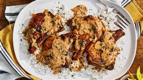 smothered-pork-chops-with-rice image