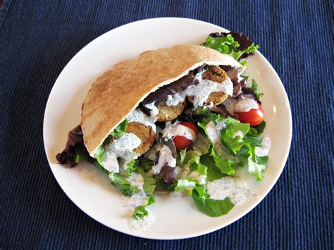 baked-falafel-sandwiches-with-creamy-dairy image