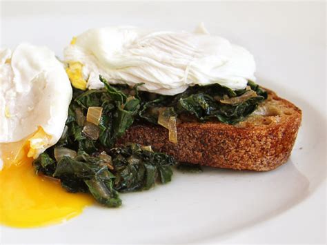 perfect-poached-eggs-and-sauteed-kale-on-toast-tasty image