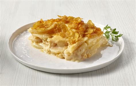 scalloped-idaho-potatoes-with-crispy-cornflake-topping image