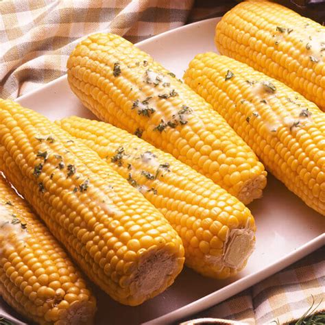 corn-on-the-cob-with-seasoned-butters-recipe-land image